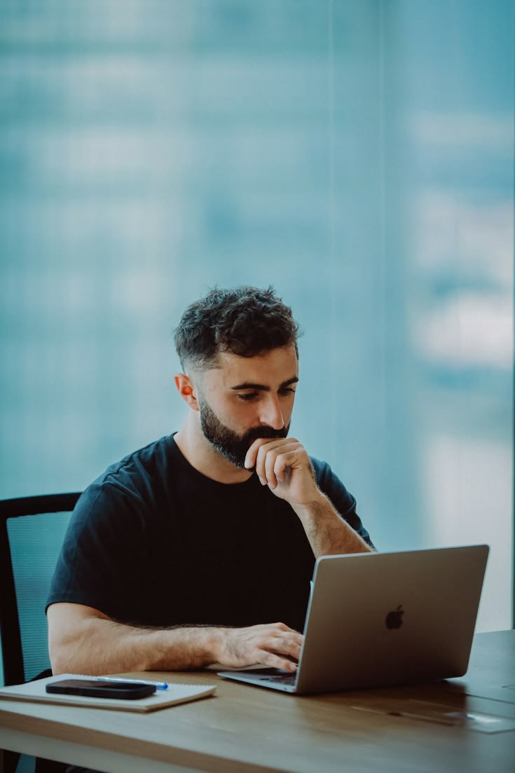 A developer working alone at a laptop